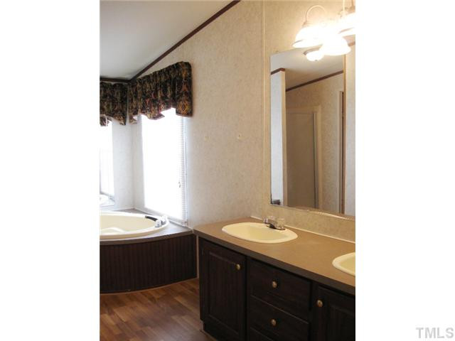 2728 Edgemont Road Wendell, NC 27591 - Photo 11 of 22 View of vanity and double sinks in master bath. Master Bath/Spa