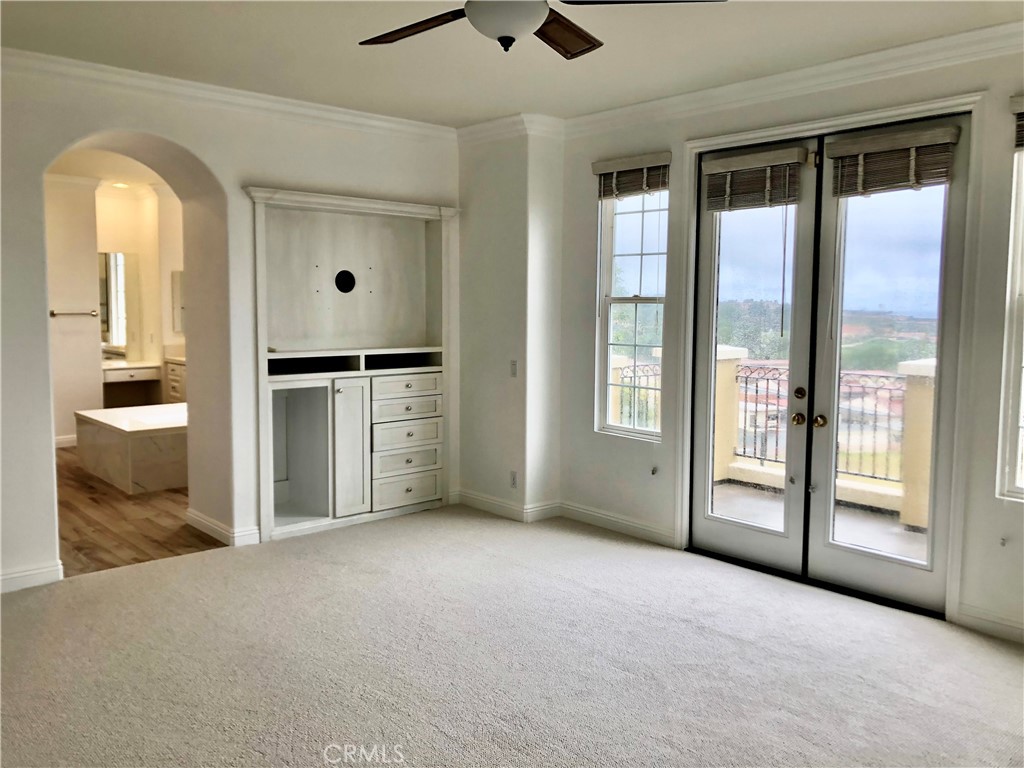 24 Tesoro Newport Coast, CA 92657 - Photo 13 of 19 a view of an empty room with a fireplace and a window