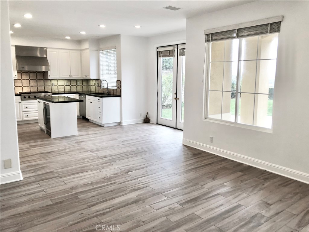 24 Tesoro Newport Coast, CA 92657 - Photo 5 of 19 a view of kitchen with wooden floor