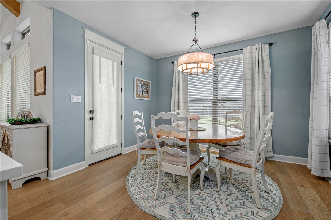 4309 Batona Court Bryan, TX 77802 - Photo 15 of 29 Dining space featuring light wood finished floors and baseboards