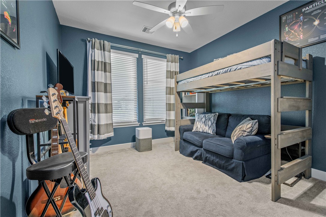 4309 Batona Court Bryan, TX 77802 - Photo 21 of 29 Bedroom with carpet floors and a ceiling fan