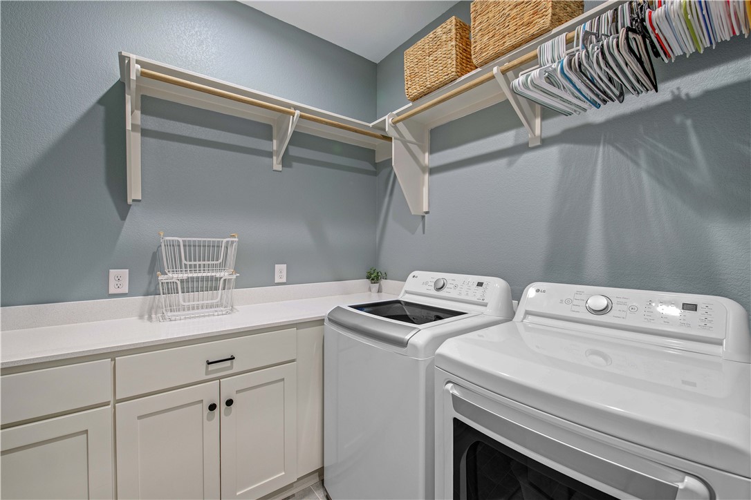4309 Batona Court Bryan, TX 77802 - Photo 24 of 29 Laundry area with independent washer and dryer