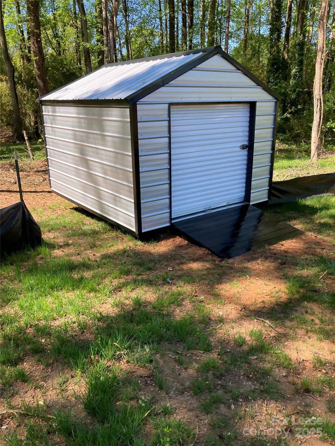 26 East J Street Maiden, NC 28650 - Photo 11 of 12 a view of house with backyard