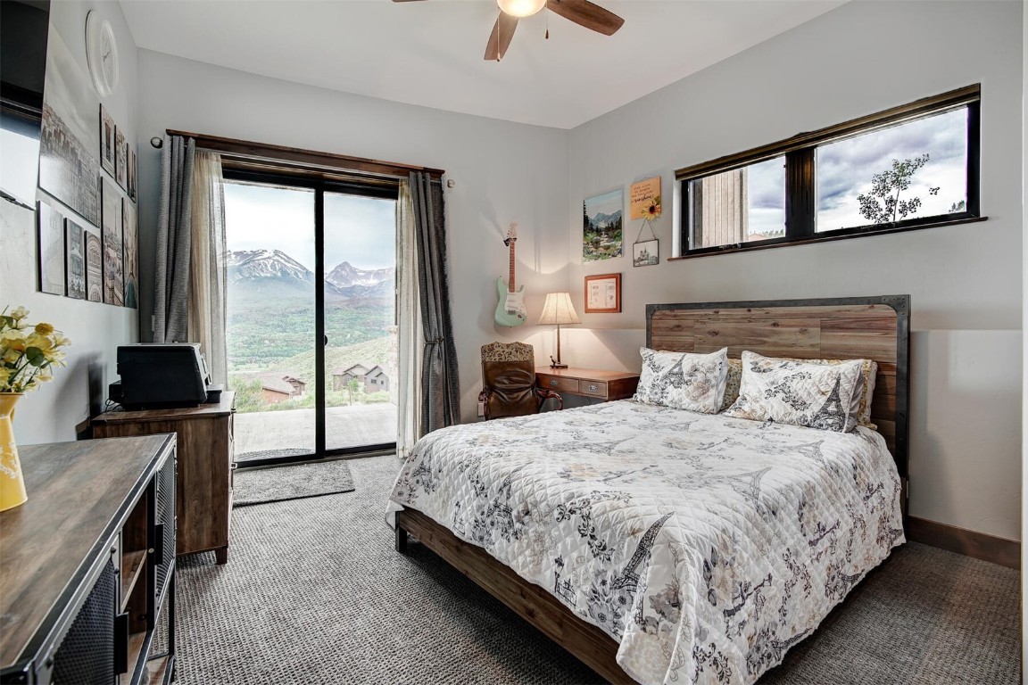 363 Angler Mountain Ranch Road Silverthorne, CO 80498 - Photo 28 of 44 Bedroom with patio access