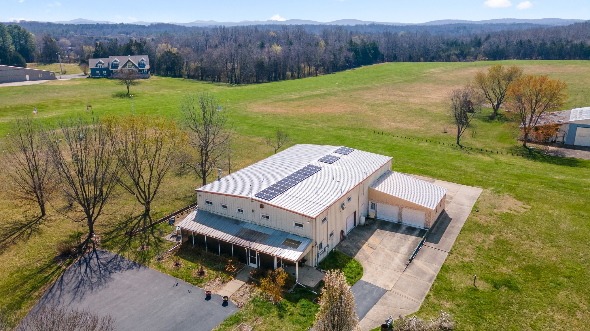 205 Gwynn Road, Unit HANGAR #8 Lebanon, TN 37090 - Photo 2 of 35 a view of a house with a yard