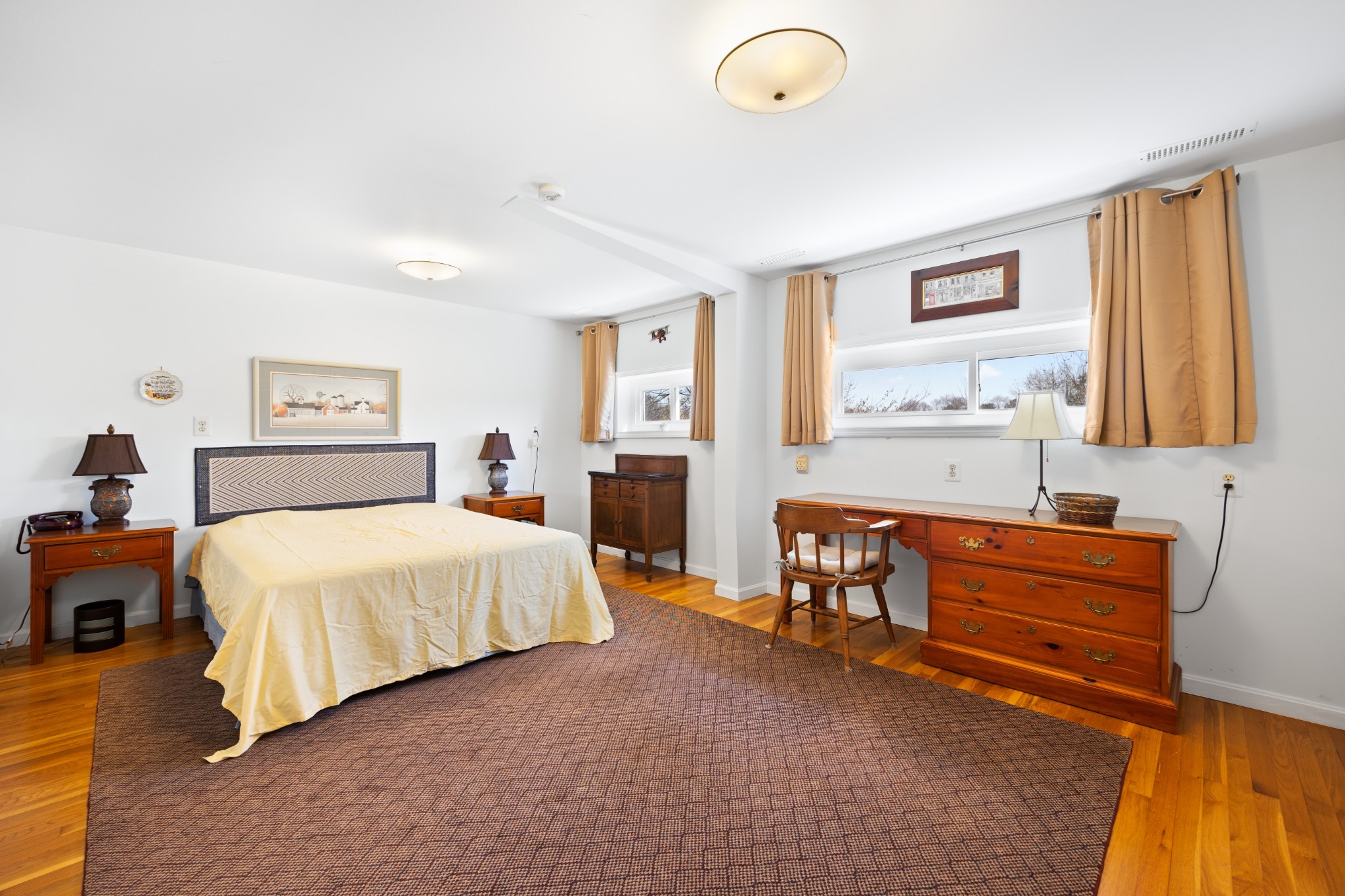 205 Gwynn Road, Unit HANGAR #8 Lebanon, TN 37090 - Photo 23 of 35 a bedroom with a bed and wooden floor