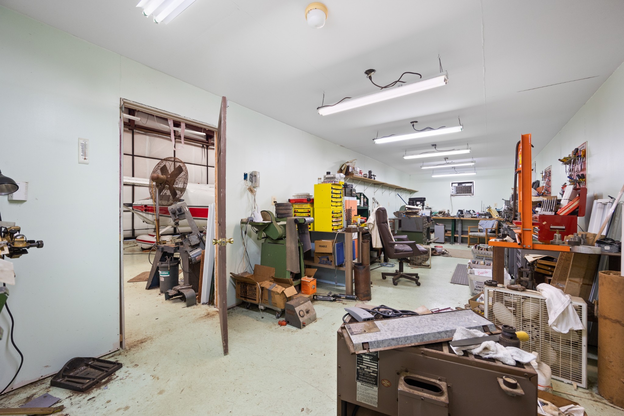 205 Gwynn Road, Unit HANGAR #8 Lebanon, TN 37090 - Photo 31 of 35 a view of a room with gym equipment and a window