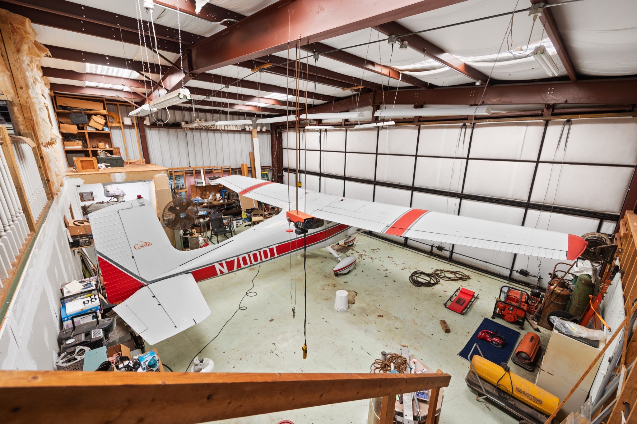 205 Gwynn Road, Unit HANGAR #8 Lebanon, TN 37090 - Photo 32 of 35 a utility room with stainless steel appliances storage and utility