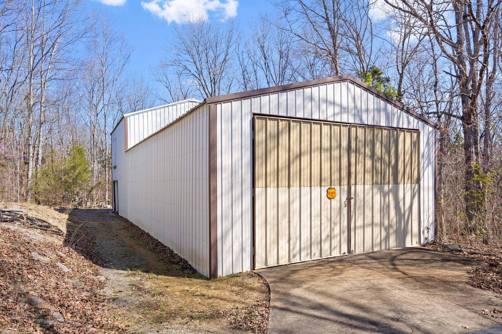 205 Gwynn Road, Unit HANGAR #8 Lebanon, TN 37090 - Photo 9 of 35 a view of a house with a yard