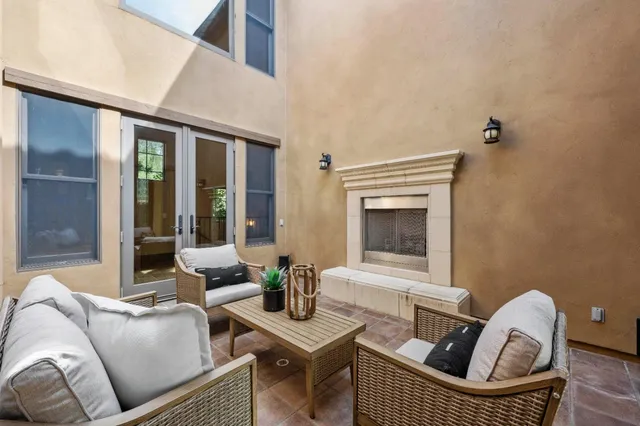 a spacious bedroom with a bed and a fireplace