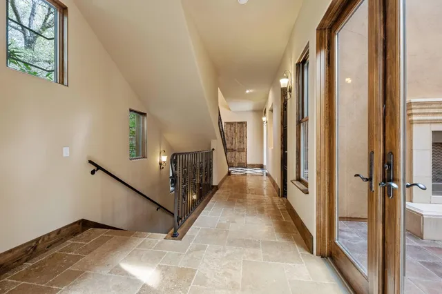 a view of a backyard with sitting area