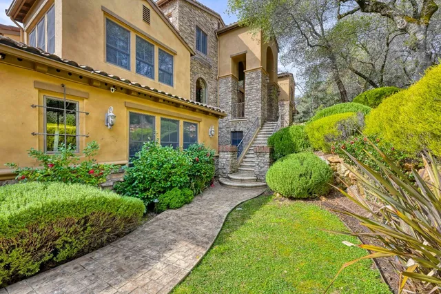 a view of street from balcony