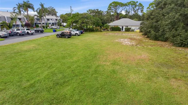 an aerial view of residential house with outdoor space