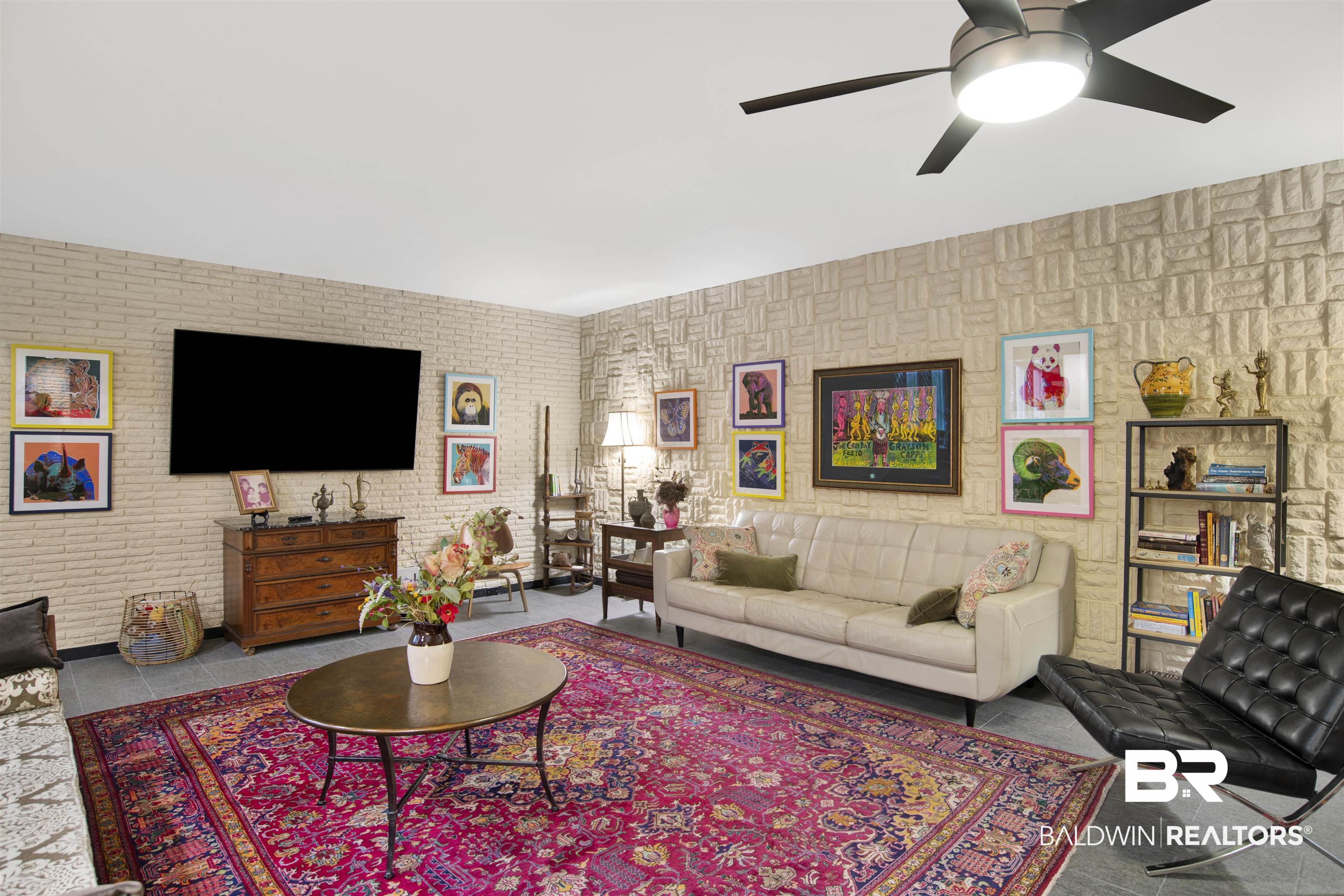 809 Bernard Circle Mobile, AL 36693 - Photo 14 of 75 Living area featuring textured wall finishes, recessed lighting, and a contemporary ceiling fan