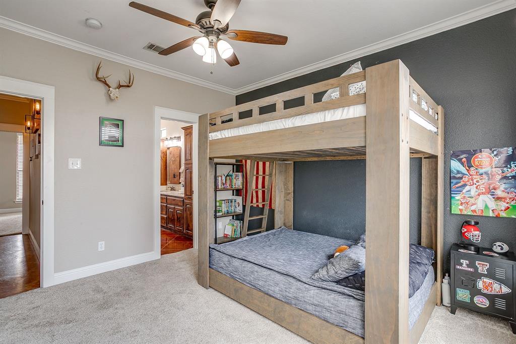 160 Goodnight Trail Rhome, TX 76078 - Photo 24 of 40 a living room with furniture and a chandelier