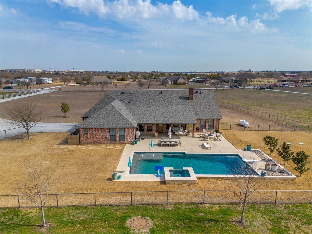 160 Goodnight Trail Rhome, TX 76078 - Photo 31 of 40 an aerial view of a house with a ocean view
