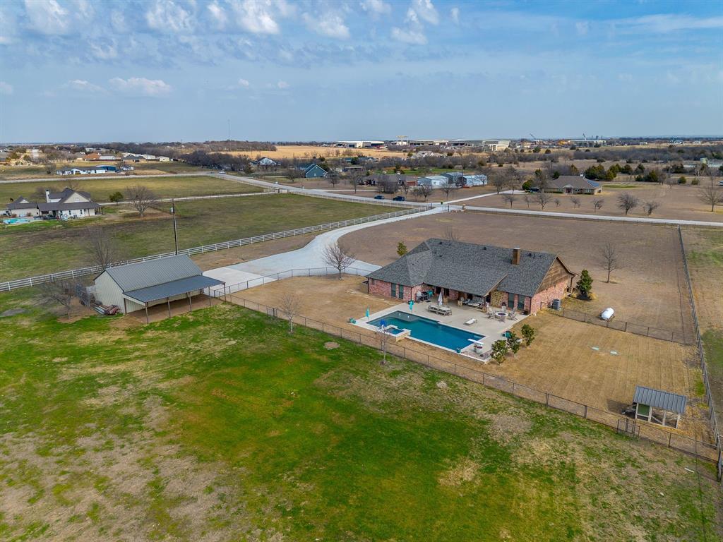 160 Goodnight Trail Rhome, TX 76078 - Photo 37 of 40 an aerial view of a house with a ocean view