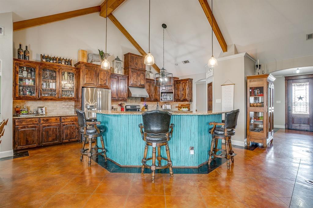 160 Goodnight Trail Rhome, TX 76078 - Photo 10 of 40 a view of a living room and kitchen