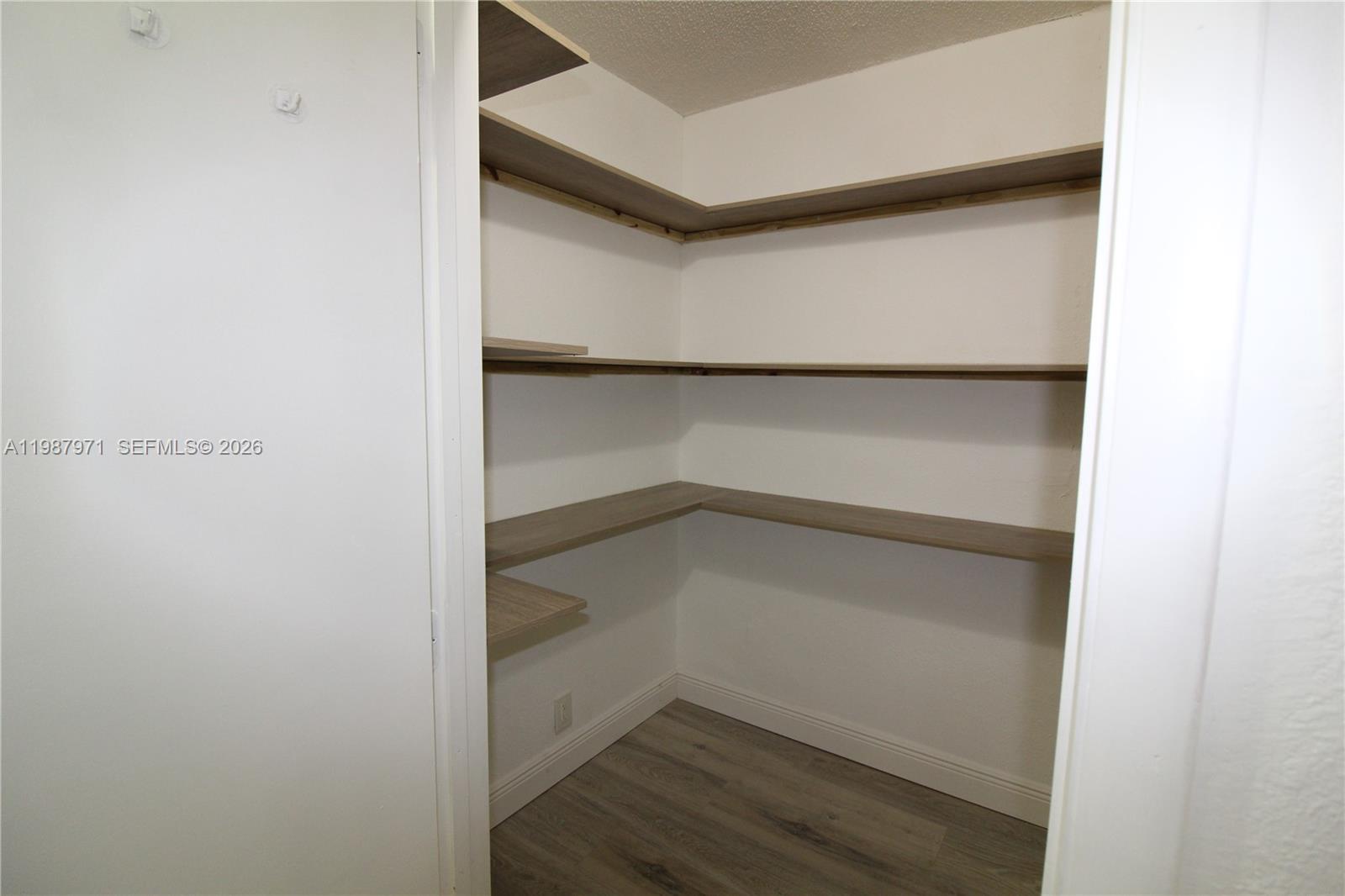 5160 Southwest 8th Street Margate, FL 33068 - Photo 11 of 23 a small space with wooden floor