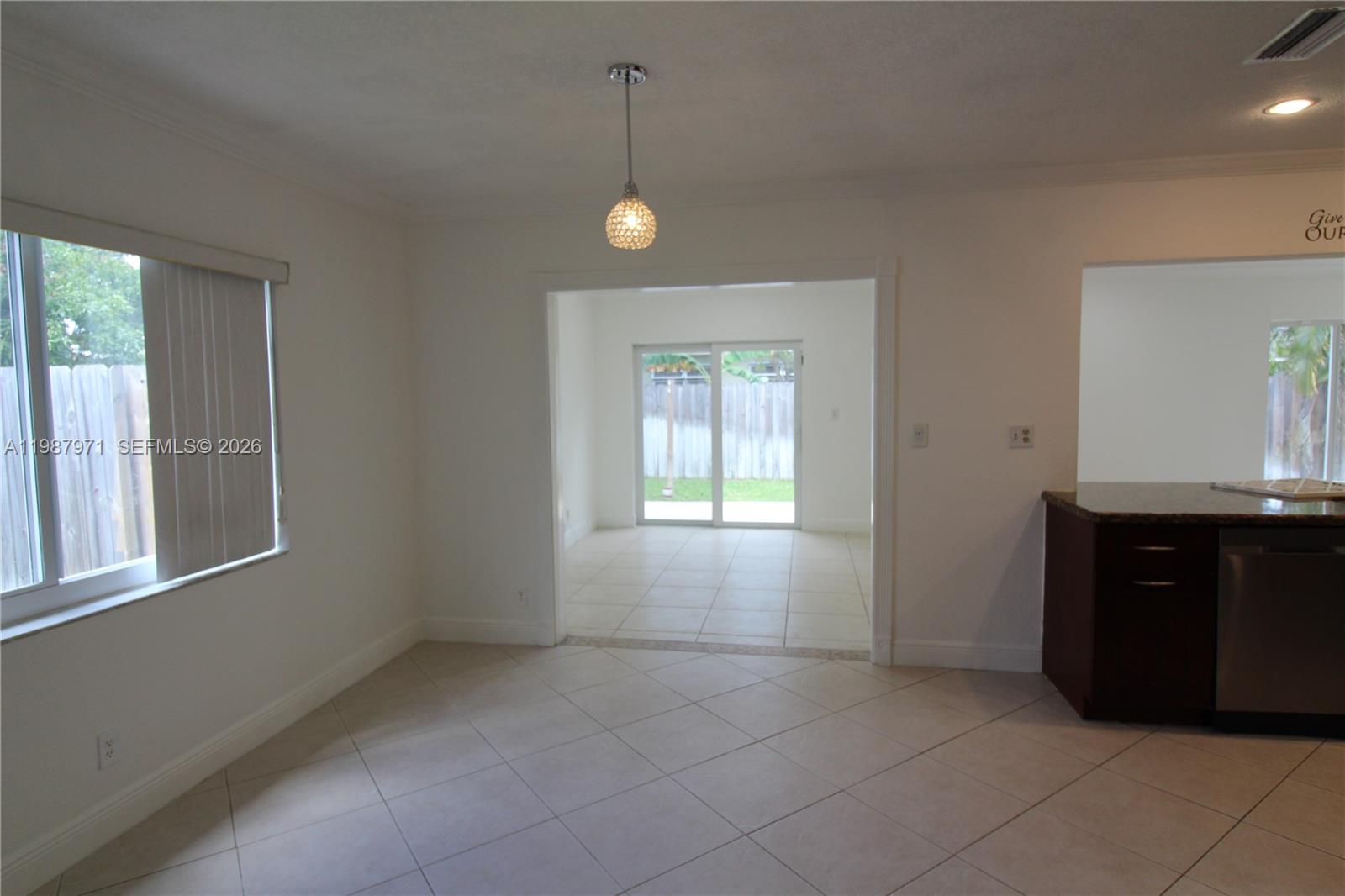 5160 Southwest 8th Street Margate, FL 33068 - Photo 14 of 23 a view of an empty room with a window