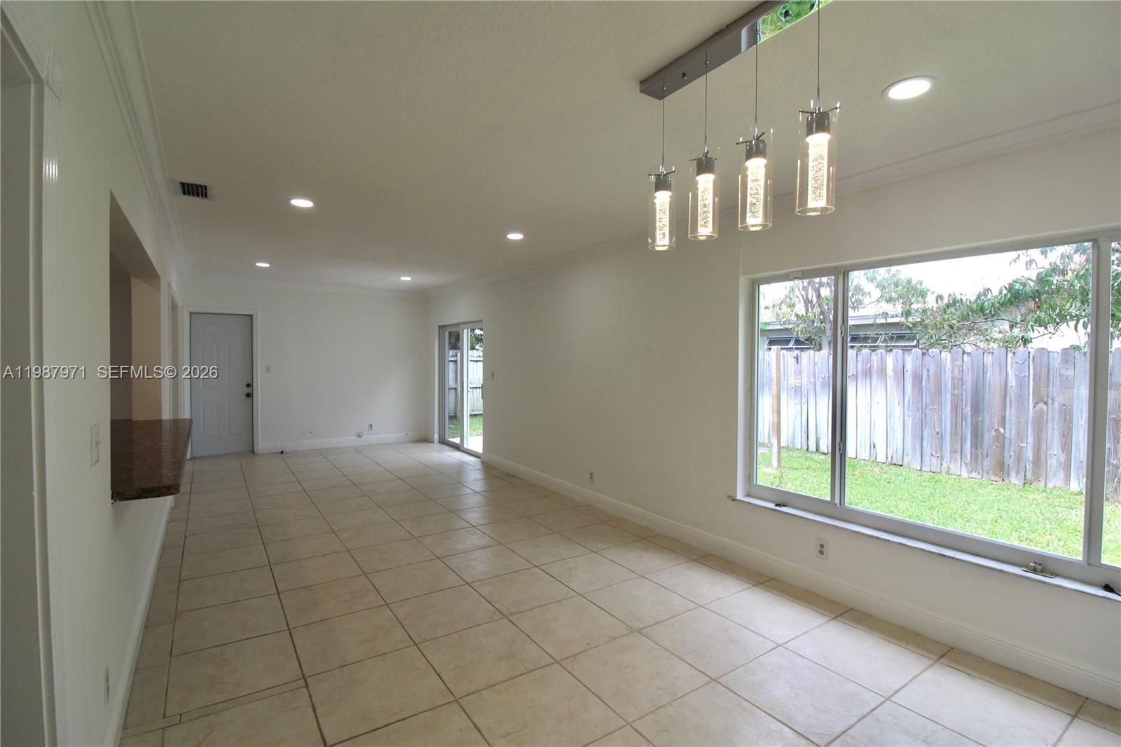 5160 Southwest 8th Street Margate, FL 33068 - Photo 15 of 23 a view of an empty room with a window