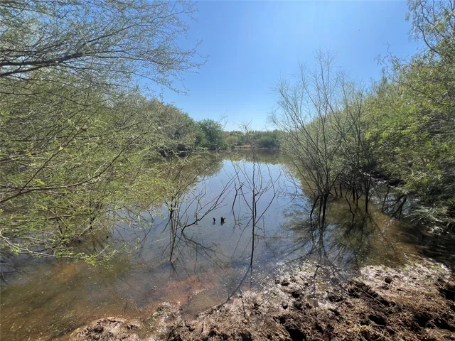 a view of a wooden fence