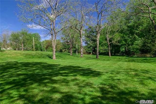 80 Harbor Road Head of the Harbor, NY 11780 - Photo 1 of 1 a view of a park with large trees