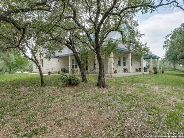 a house view with a garden space