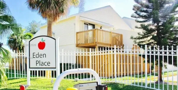 a view of a street with sign board