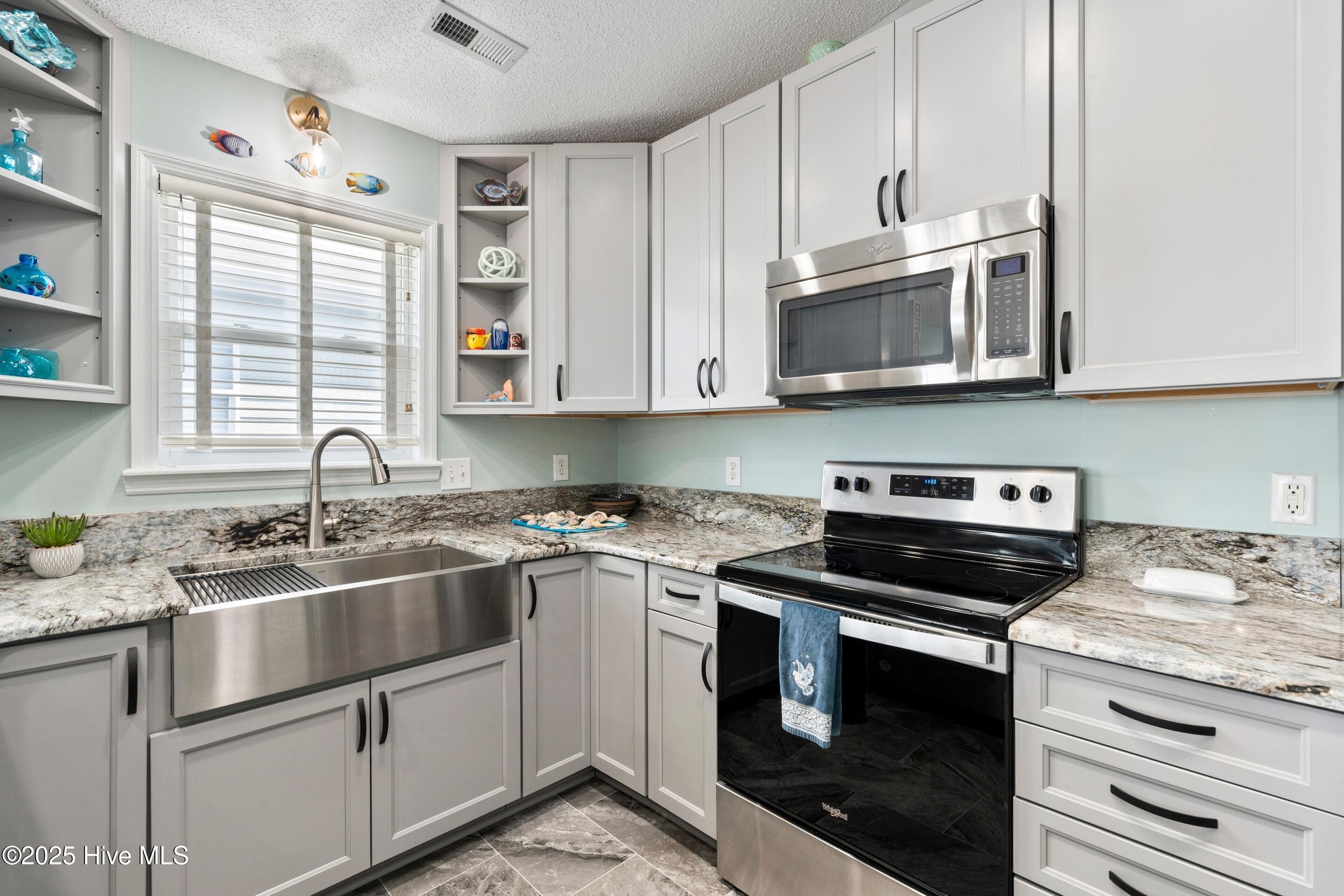 419 27th Street, Unit D Sunset Beach, NC 28468 - Photo 12 of 22 Kitchen
