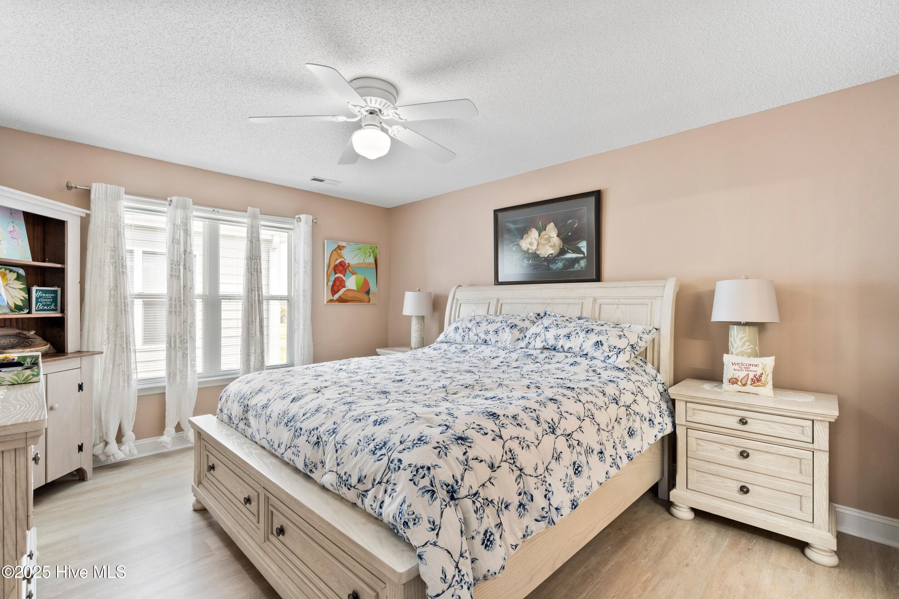 419 27th Street, Unit D Sunset Beach, NC 28468 - Photo 17 of 22 Master Bedroom
