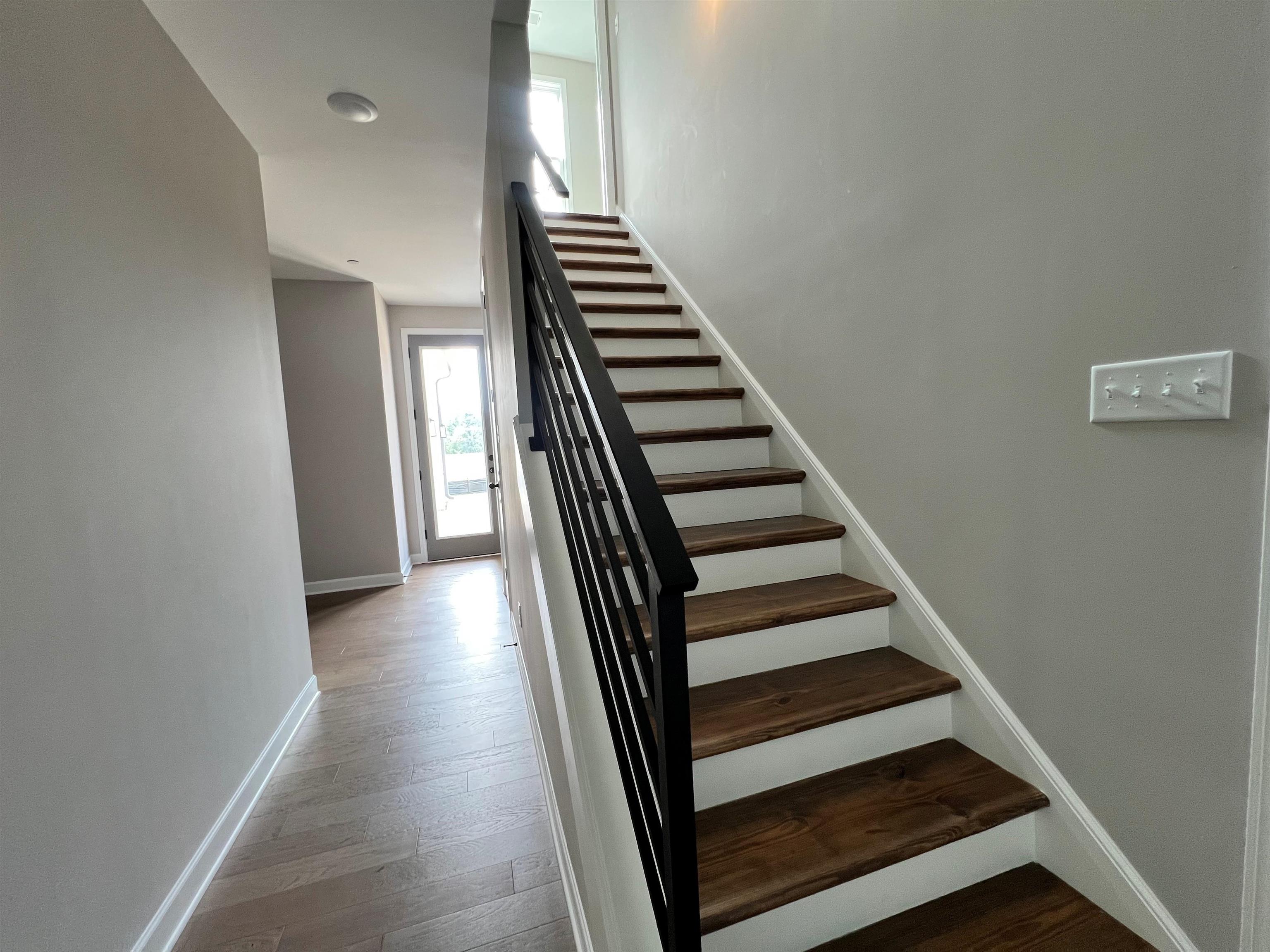 220 Drake Drive Collierville, TN 38017 - Photo 17 of 30 a view of entryway and hall with wooden floor