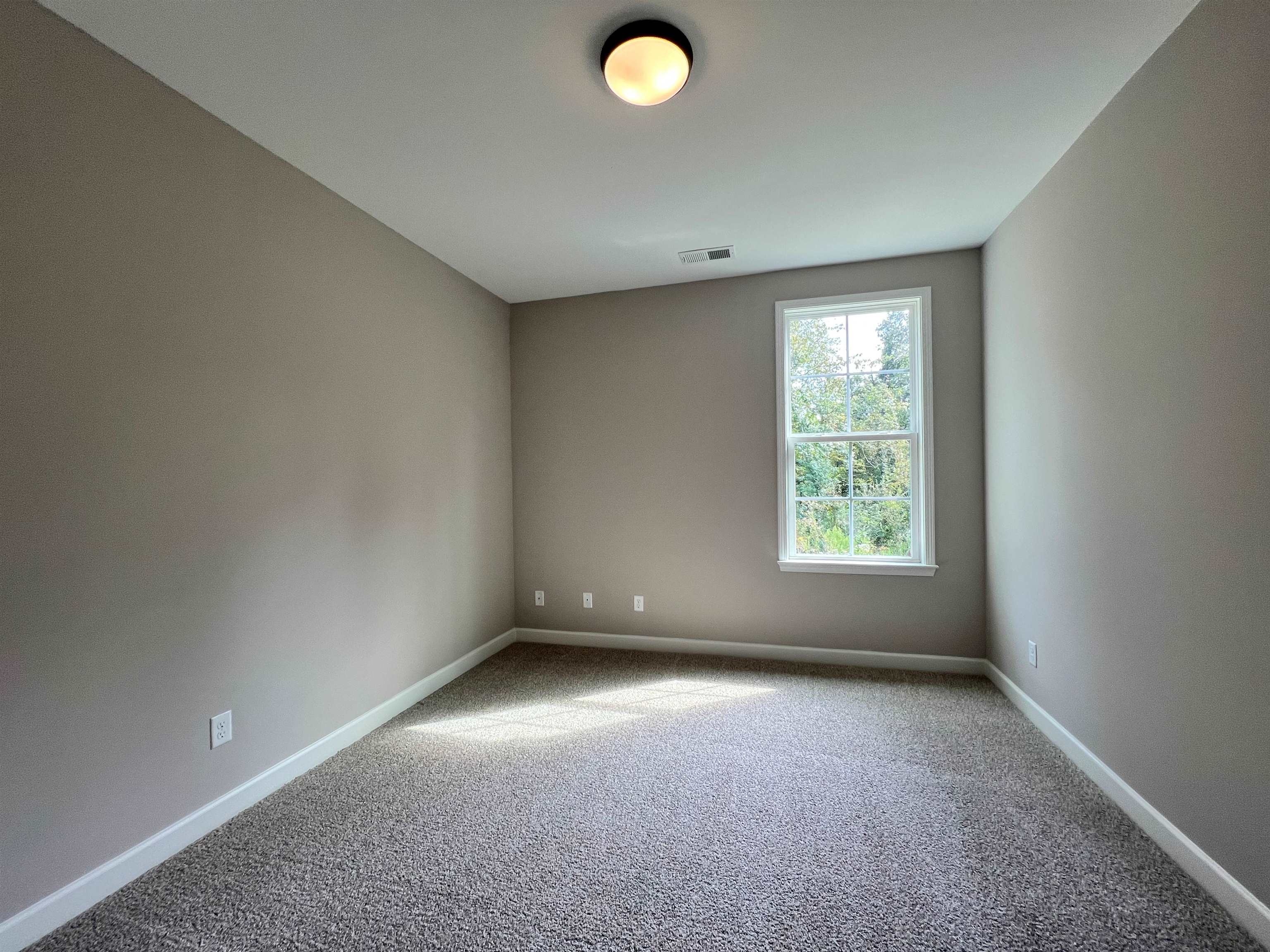 220 Drake Drive Collierville, TN 38017 - Photo 20 of 30 an empty room with windows and air conditioner