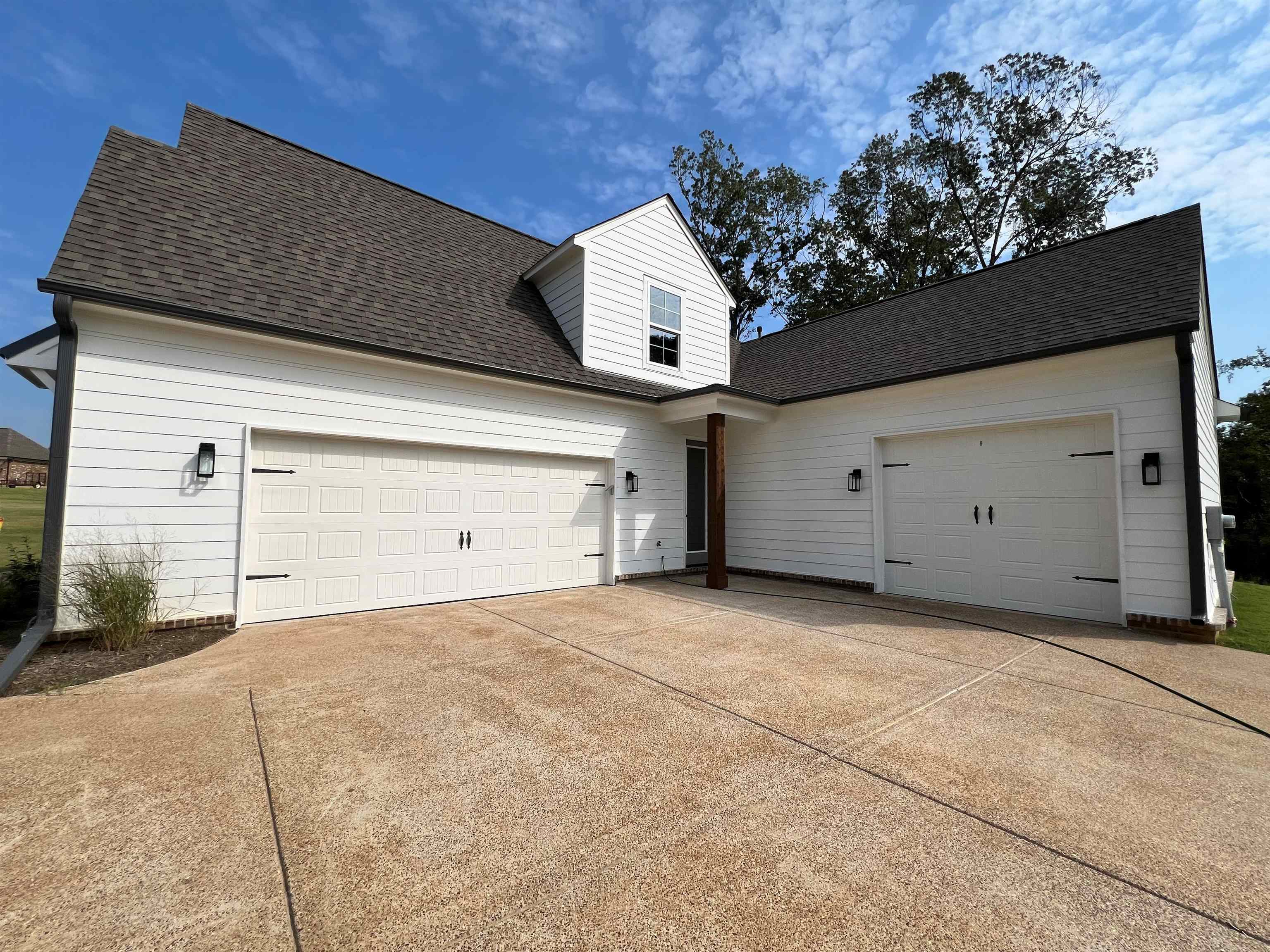 220 Drake Drive Collierville, TN 38017 - Photo 25 of 30 a house with trees in front of it