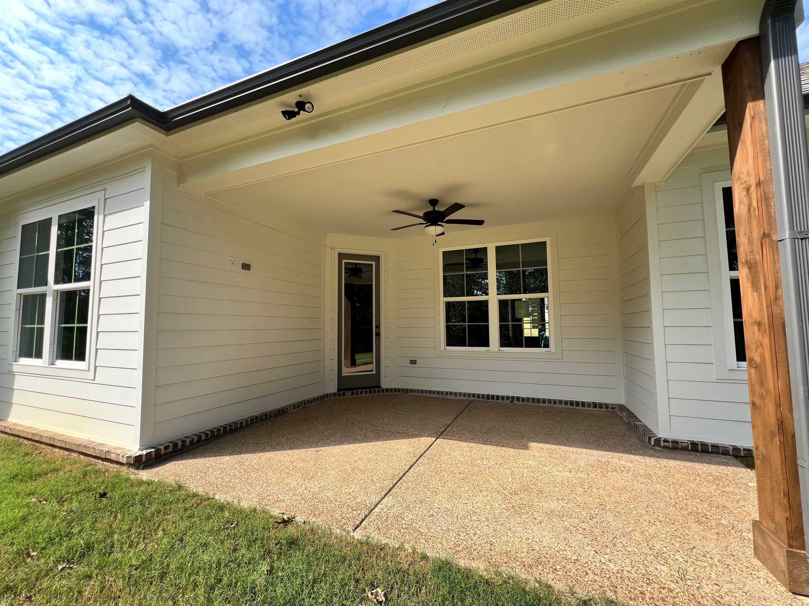 220 Drake Drive Collierville, TN 38017 - Photo 26 of 30 a view of a back yard of the house
