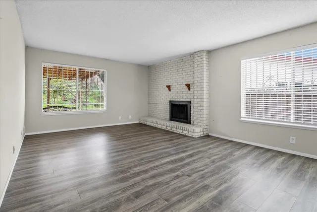 a kitchen with stainless steel appliances granite countertop a sink and a stove