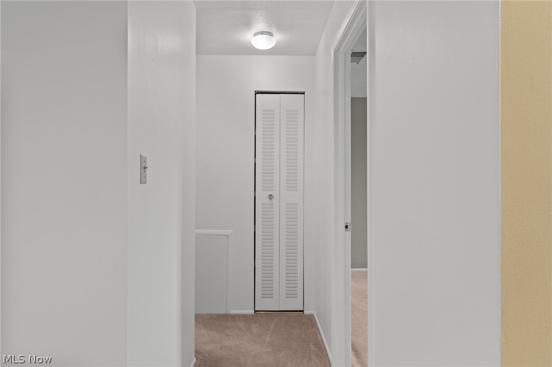 3070 Kent Road, Unit 312D Stow, OH 44224 - Photo 26 of 49 Recessed ceiling light fixture and carpeted flooring