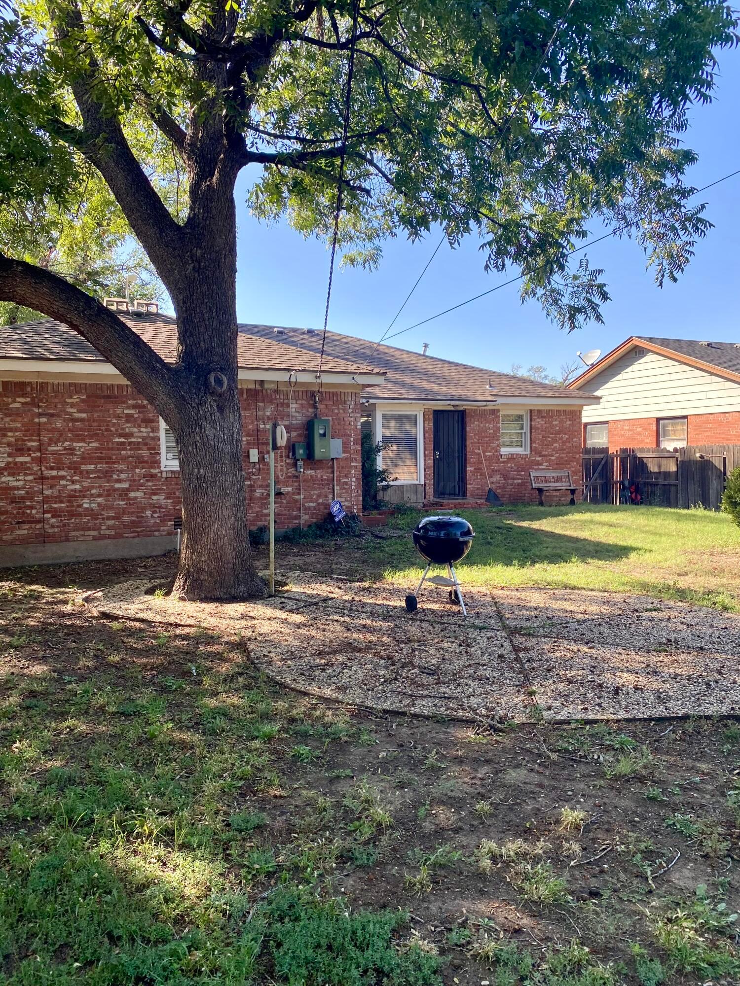 3309 Paramount Boulevard Amarillo, TX 79109 - Photo 23 of 26 a view of a house with a yard and sitting area