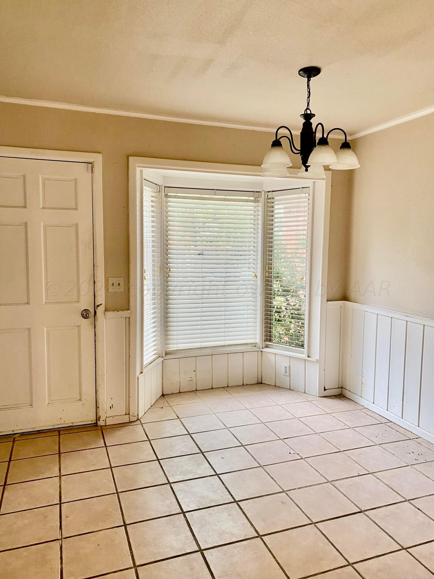 3309 Paramount Boulevard Amarillo, TX 79109 - Photo 8 of 26 a view of empty room with windows