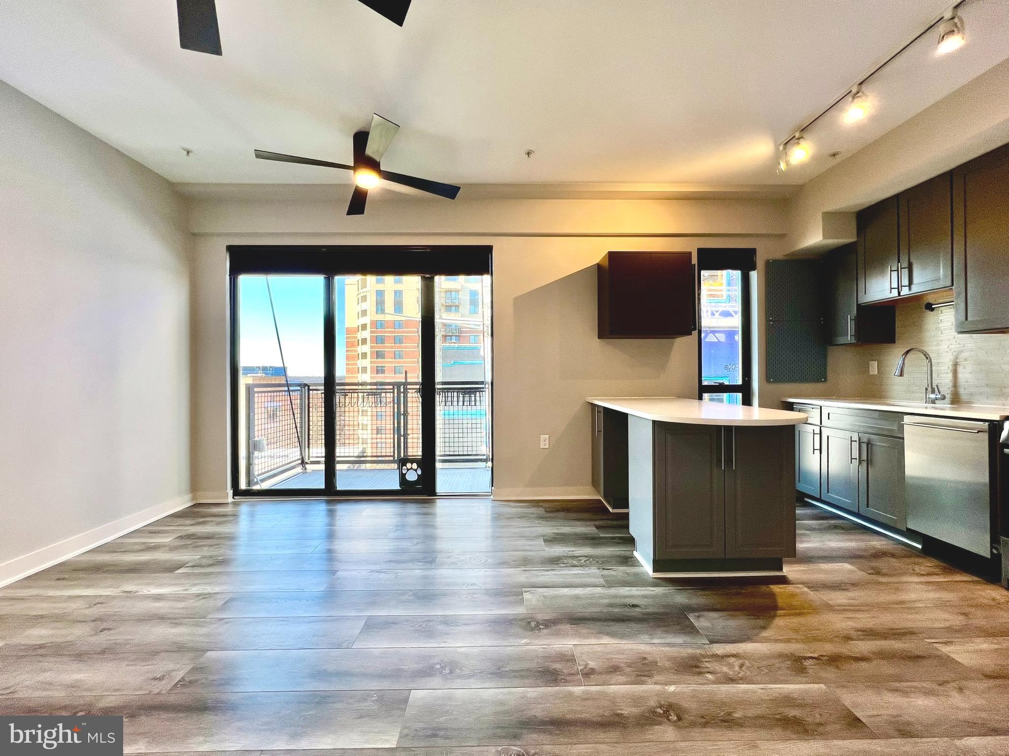 1320 Fenwick Lane, Unit 808 Silver Spring, MD 20910 - Photo 4 of 29 Living room & kitchen