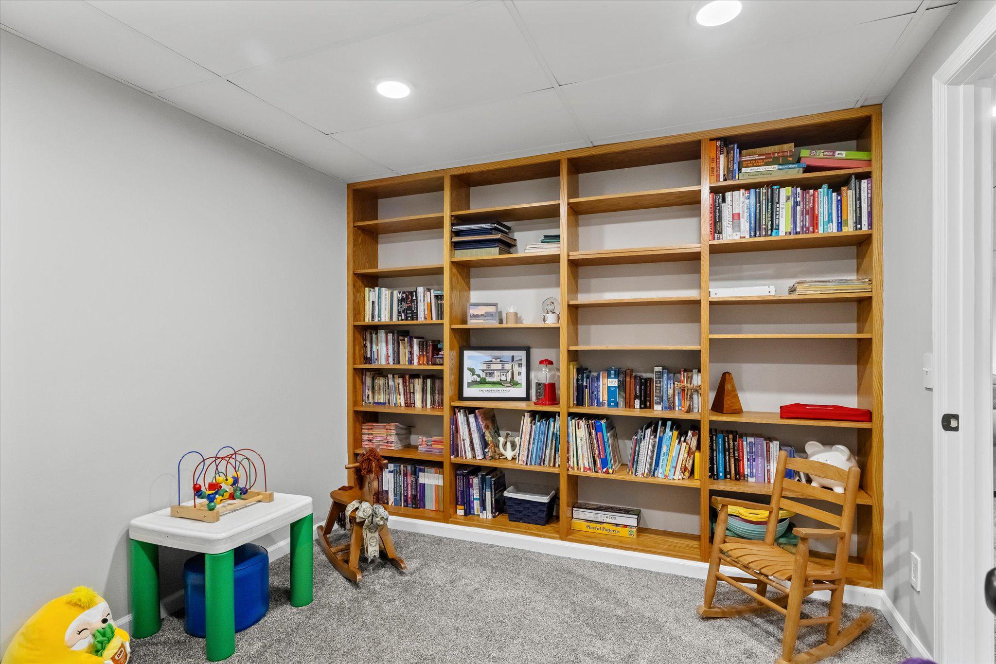 230 Richards Ferry Road Fredericksburg, VA 22406 - Photo 47 of 96 Cozy reading nook with vibrant shelves.