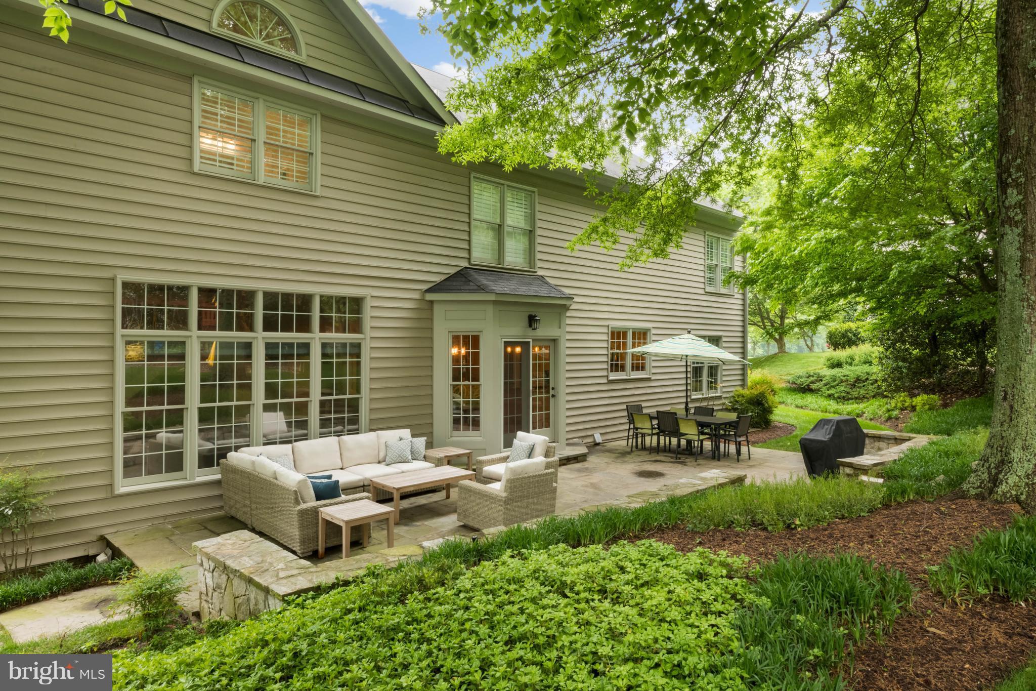 11 Watkins Row Edgewater, MD 21037 - Photo 12 of 30 Stone patio, lushly landscaped w/ sprinkler system