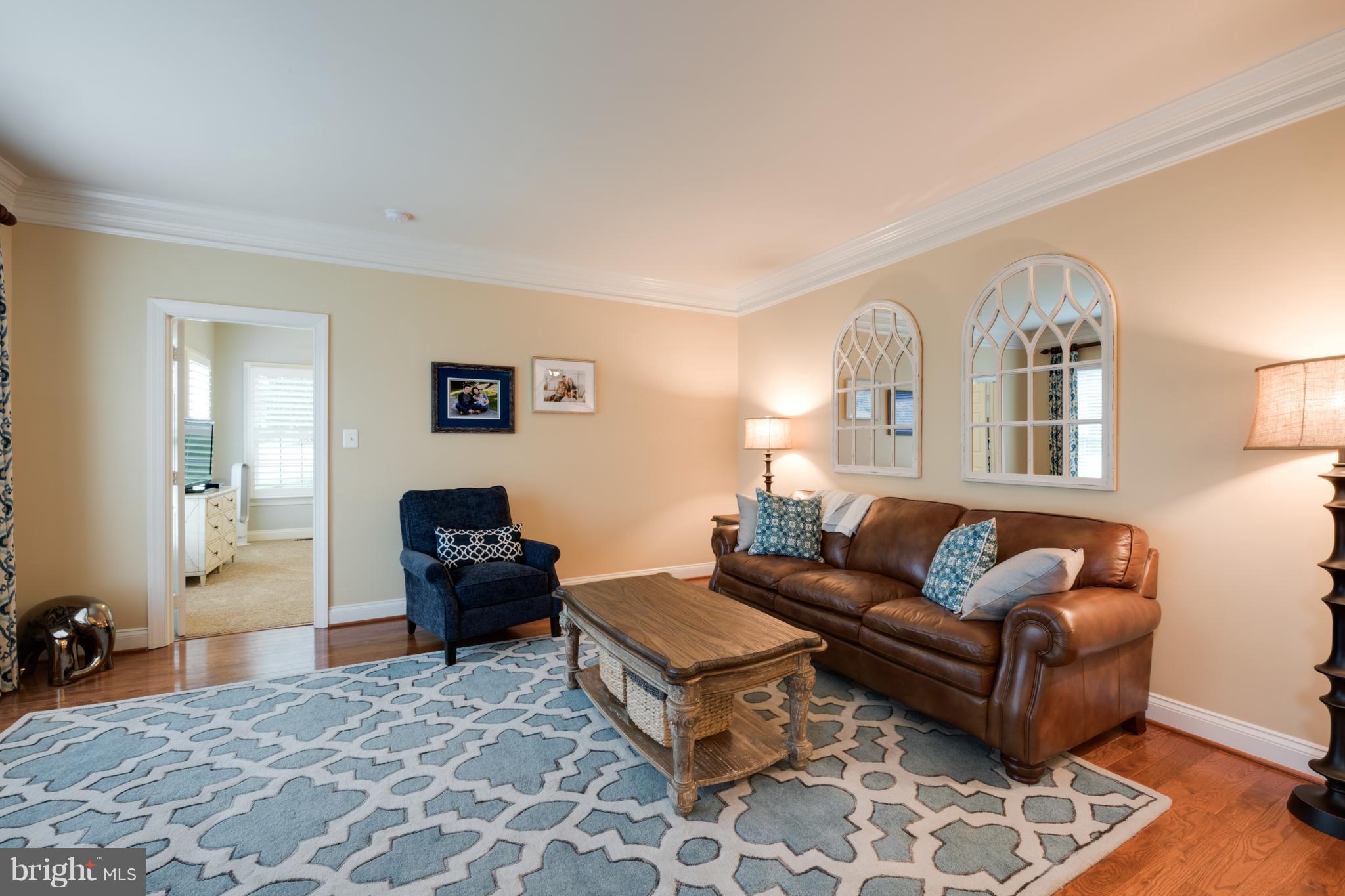 11 Watkins Row Edgewater, MD 21037 - Photo 8 of 30 Living Room with crown molding/gleaming HW floors