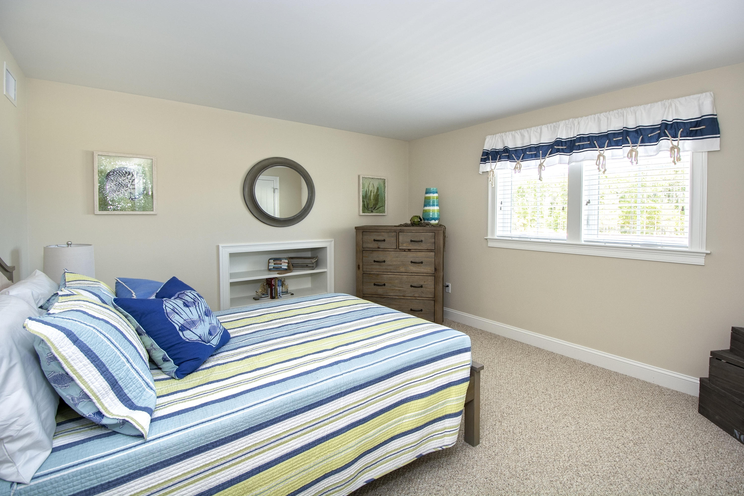67 Cottage Lane Mashpee, MA 02649 - Photo 15 of 31 a bedroom with a bed and a window