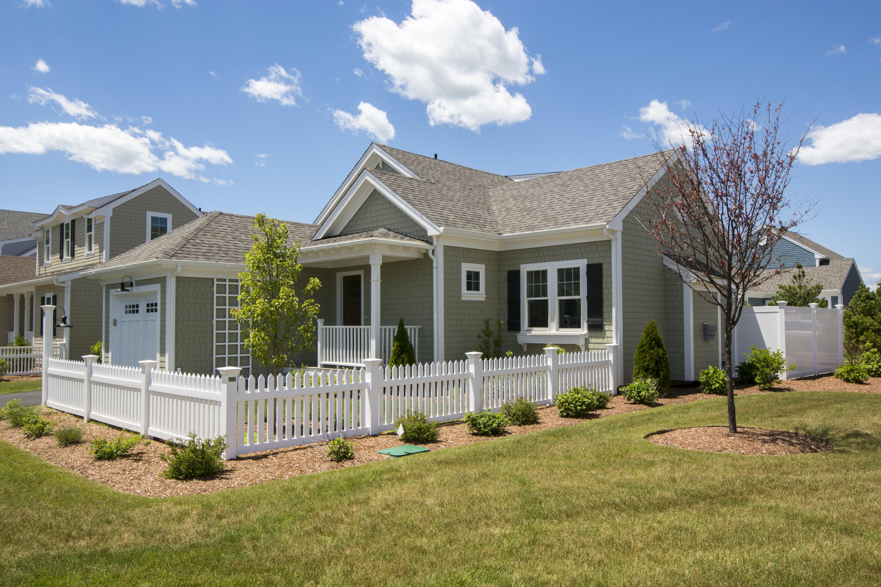 67 Cottage Lane Mashpee, MA 02649 - Photo 19 of 31 a front view of a house with a yard