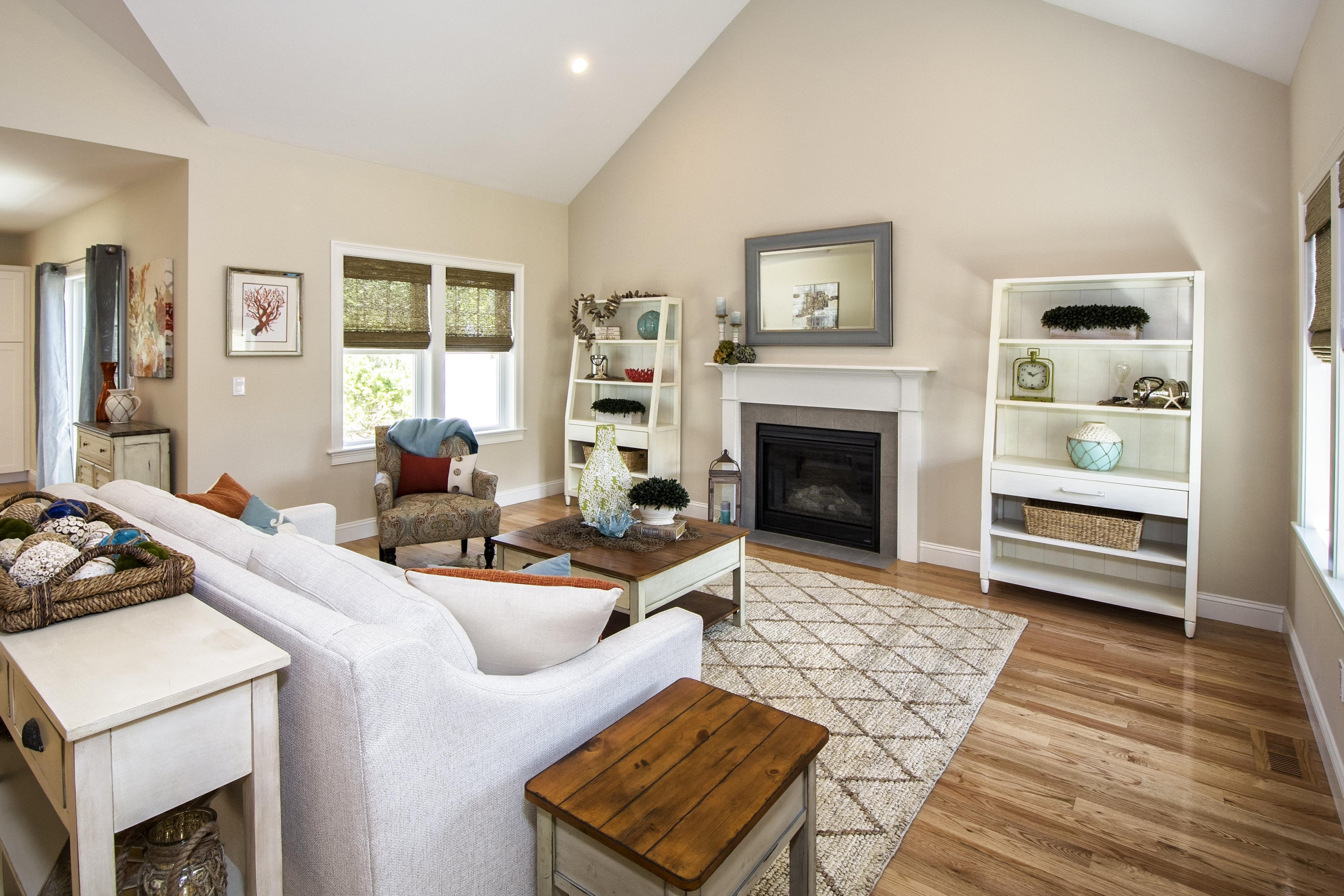 67 Cottage Lane Mashpee, MA 02649 - Photo 4 of 31 a living room with furniture and a fireplace