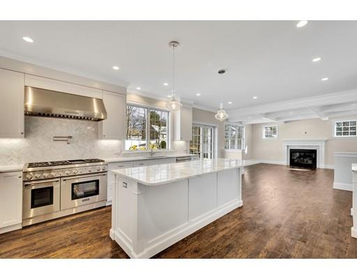 60 Bridge Street Needham, MA 02494 - Photo 8 of 28 a kitchen with a stove top oven and refrigerator
