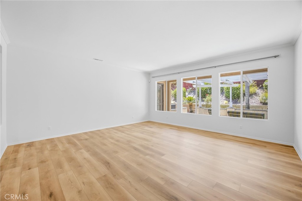 8710 Windmill Place Riverside, CA 92508 - Photo 8 of 66 a view of an empty room with a window