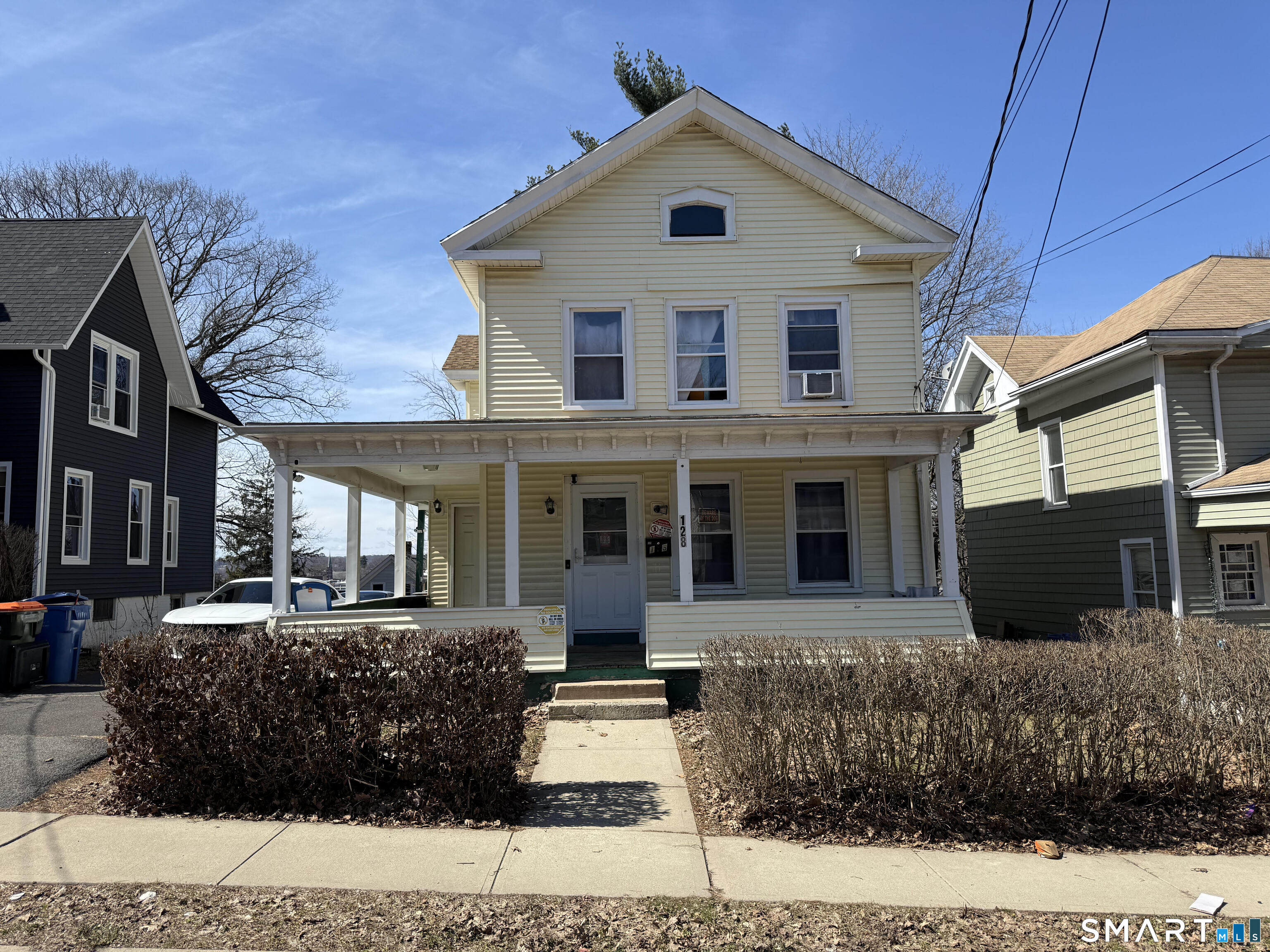 128 Hobart Street Meriden, CT 06450 - Photo 1 of 15 a front view of a house with garden
