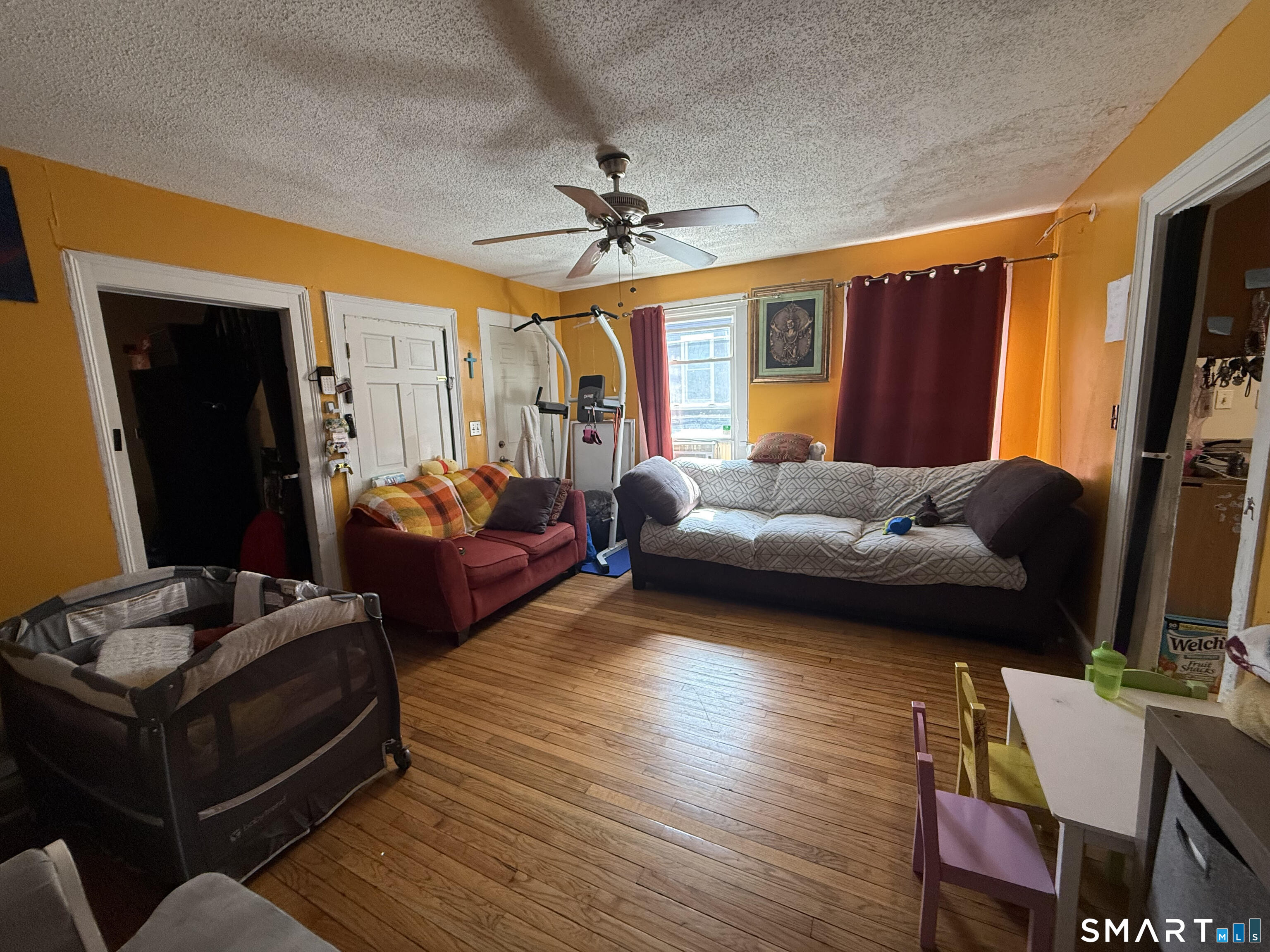 128 Hobart Street Meriden, CT 06450 - Photo 5 of 15 a bedroom with furniture and a window
